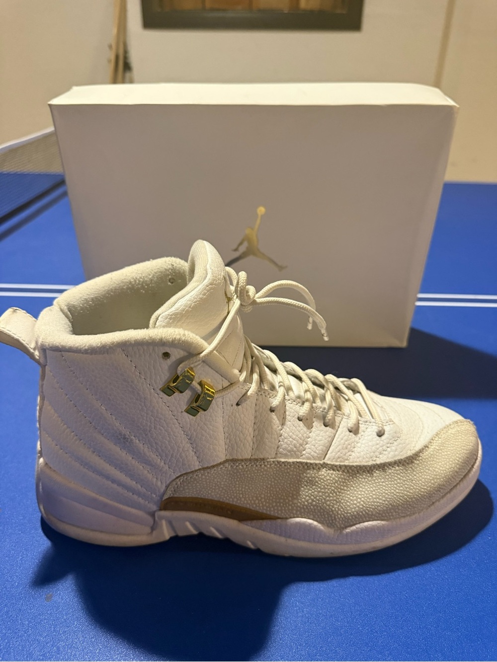 Jordan Men’s White High-Top Sneakers with Gold Accents
